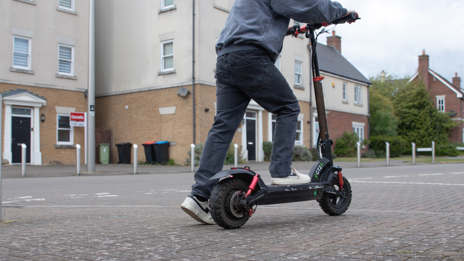 A man rides on a private e-scooter