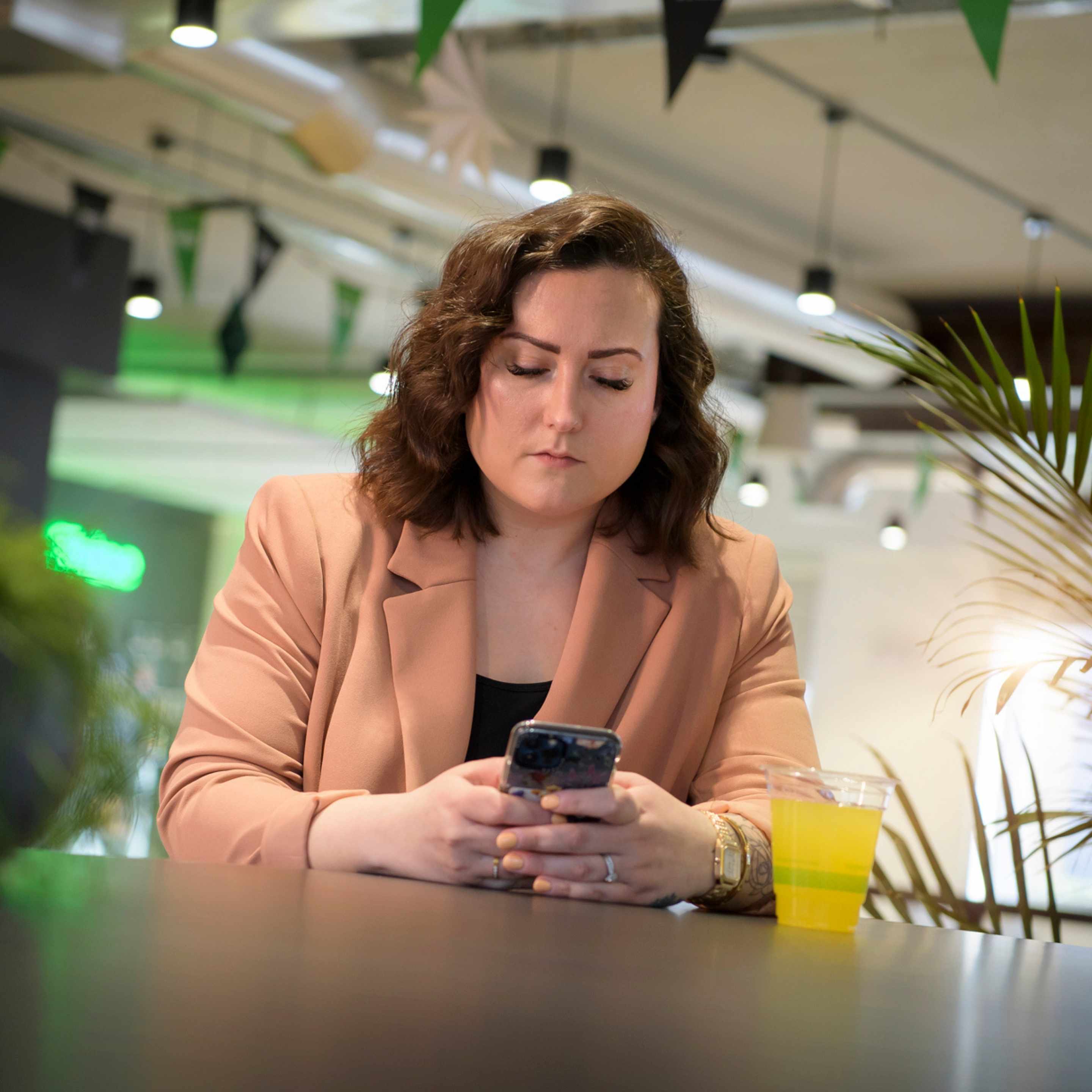 A woman using her mobile phone.